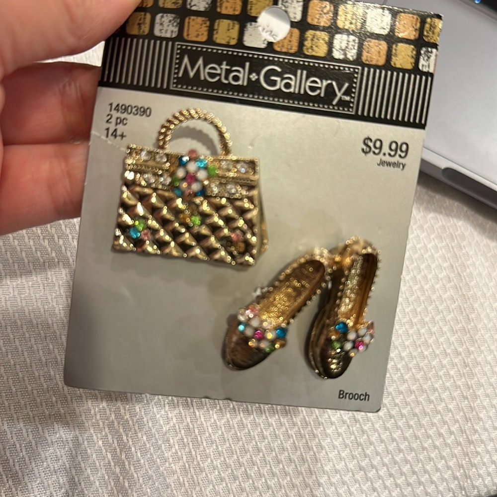 Metal, gallery purse handbag, and women’s flower brooches with colored stones